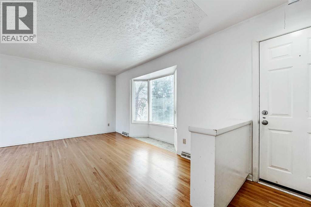 48 Westover Drive SW, Calgary, Alberta  T3C 2S4 - Photo 4 - A2303369