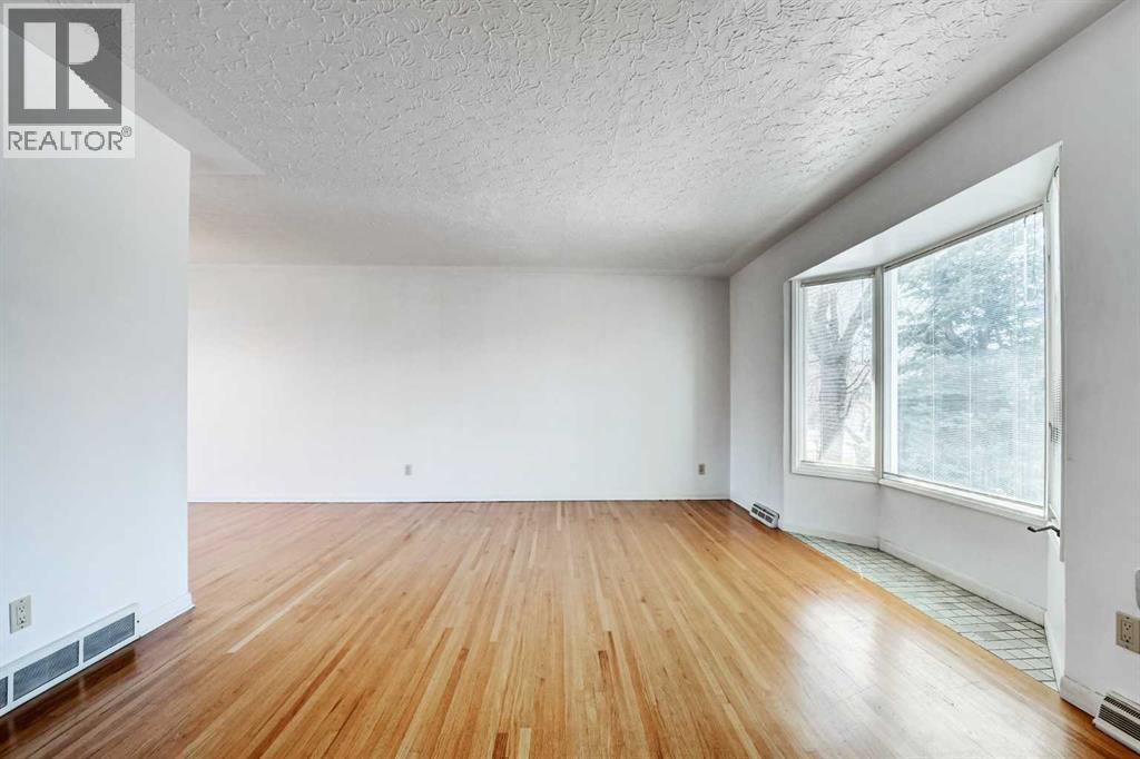 48 Westover Drive SW, Calgary, Alberta  T3C 2S4 - Photo 6 - A2303369