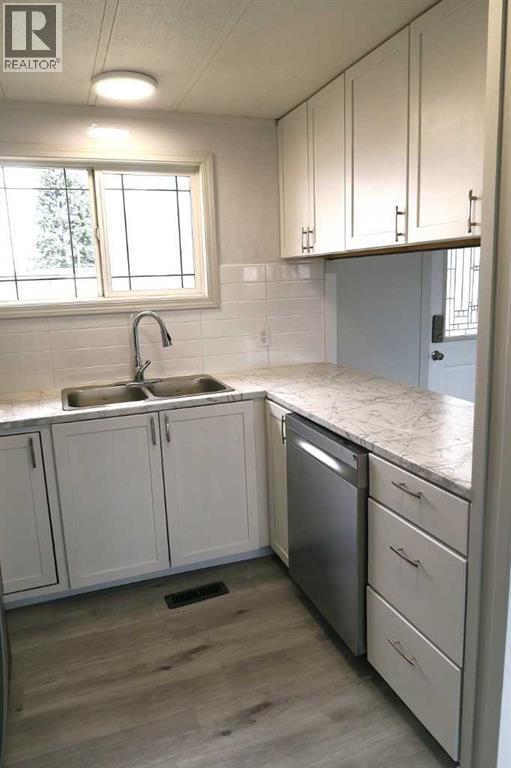 28 Riley Street NE, High River, Alberta  T2V 1G5 - Photo 2 - A2299302