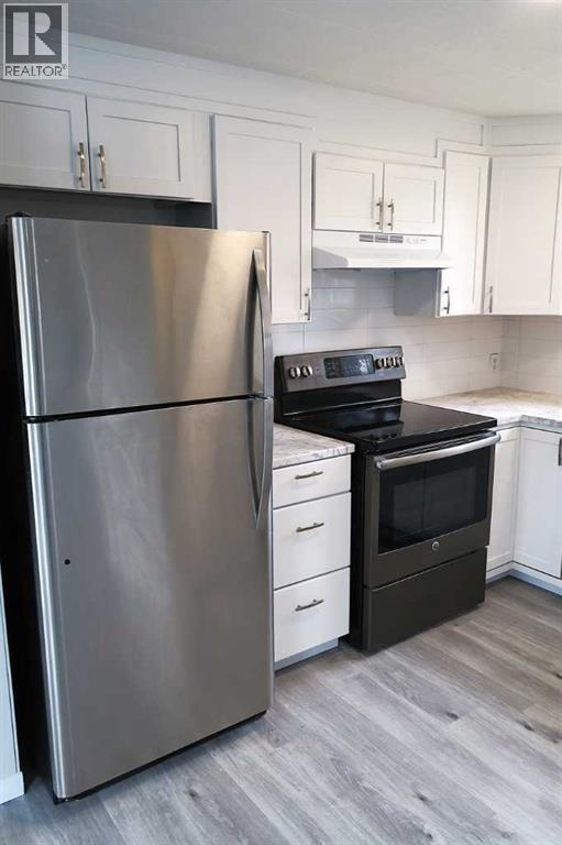 28 Riley Street NE, High River, Alberta  T2V 1G5 - Photo 1 - A2299302