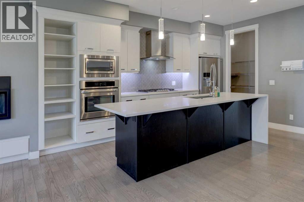 624 20 Avenue NW, Calgary, Alberta  T2M 1C8 - Photo 2 - A2304295