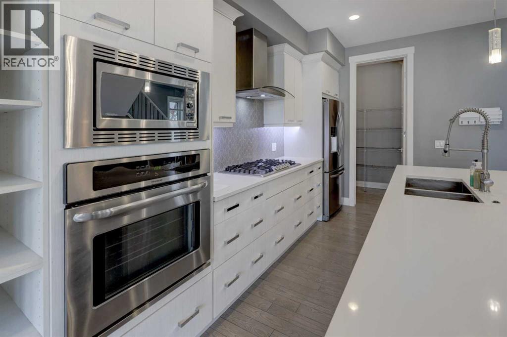 624 20 Avenue NW, Calgary, Alberta  T2M 1C8 - Photo 3 - A2304295