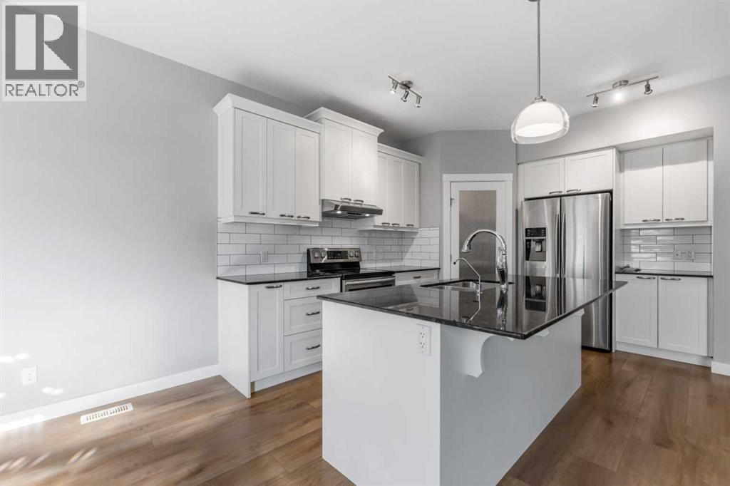 625 Midtown Place SW, Airdrie, Alberta  T4B 4E3 - Photo 9 - A2287948