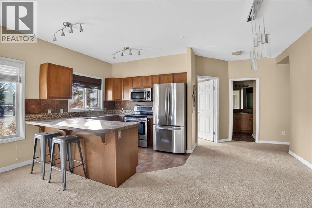 4103, 92 Crystal Shores Road, Okotoks, Alberta  T1S 2N2 - Photo 2 - A2286784