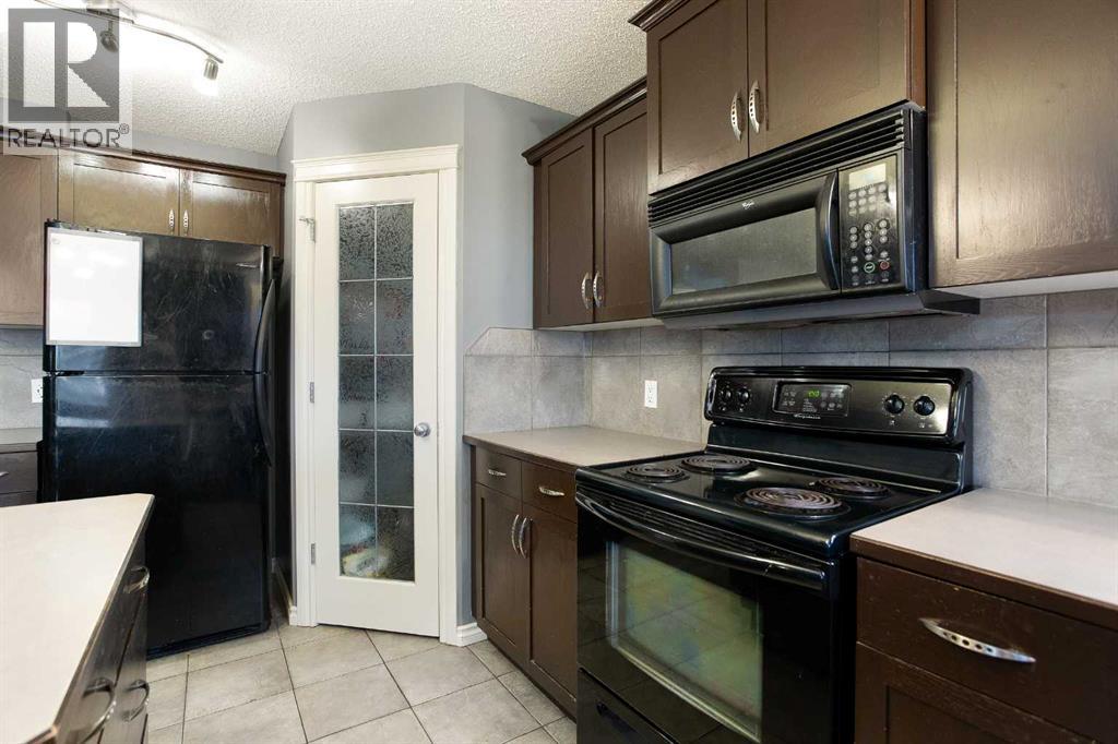 2832 Coopers Manor SW, Airdrie, Alberta  T4B 3J7 - Photo 13 - A2291220