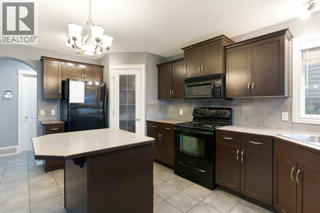 2832 Coopers Manor SW, Airdrie, Alberta  T4B 3J7 - Photo 12 - A2291220