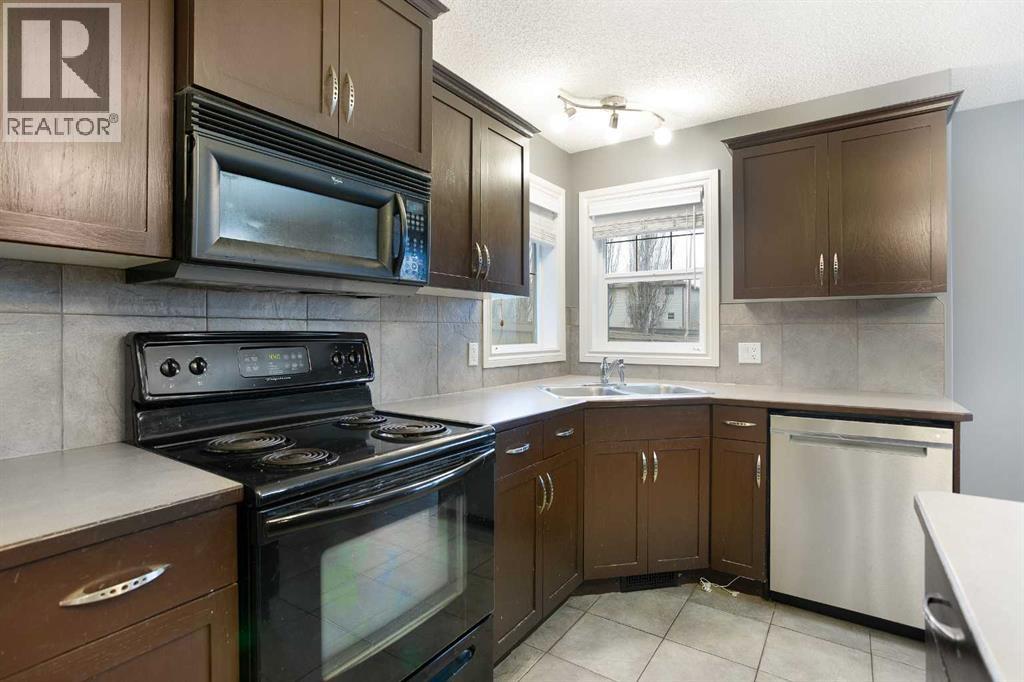 2832 Coopers Manor SW, Airdrie, Alberta  T4B 3J7 - Photo 14 - A2291220