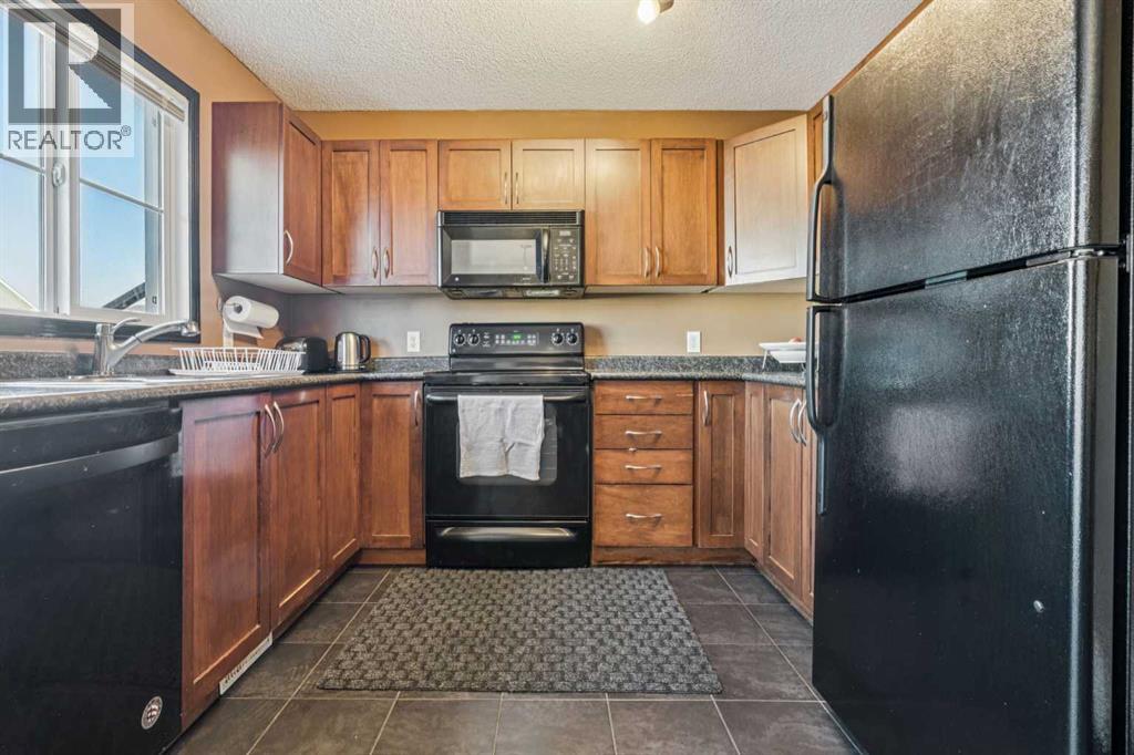 110 Eversyde Common SW, Calgary, Alberta  T2Y 4Z6 - Photo 13 - A2302863