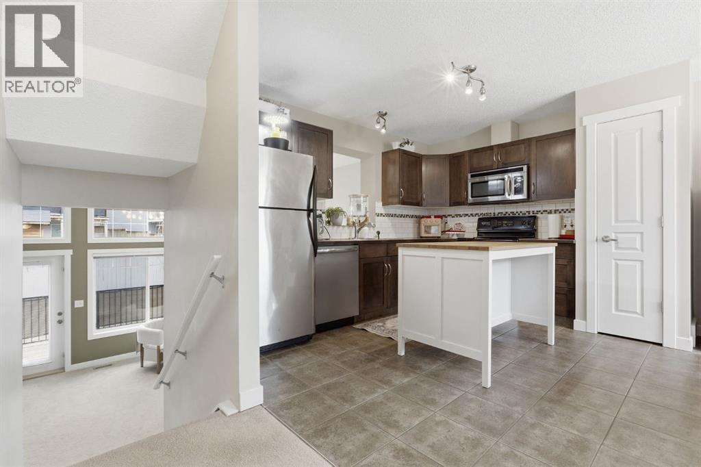 71 Cimarron Vista Gardens, Okotoks, Alberta  T1S 0G3 - Photo 10 - A2303911