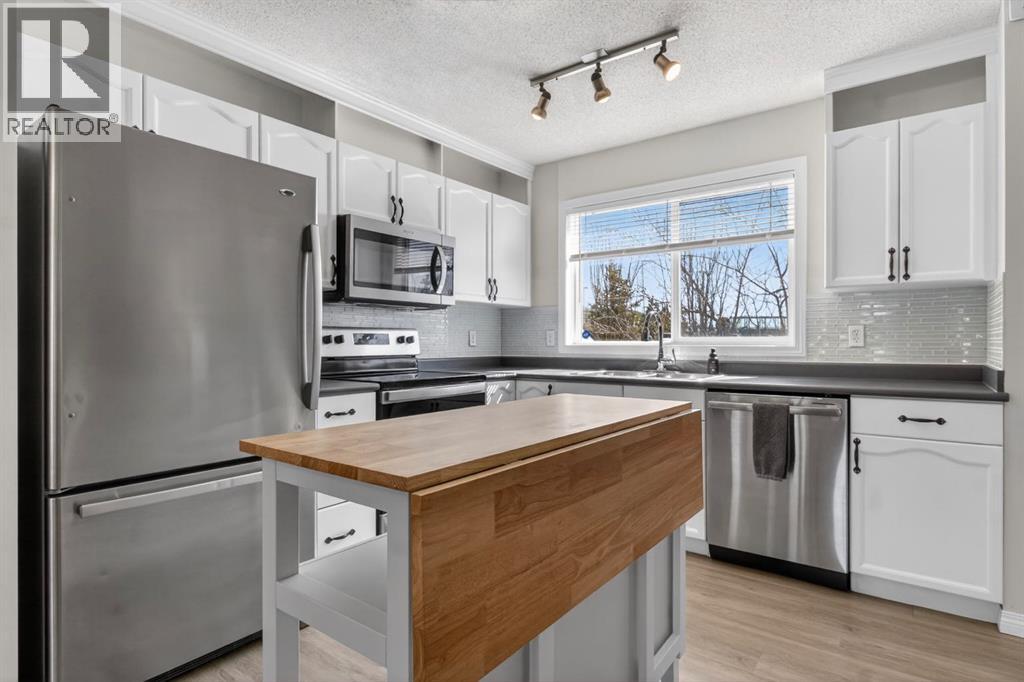 41 Tuscany Springs Gardens NW, Calgary, Alberta  T3L 2R3 - Photo 4 - A2302882