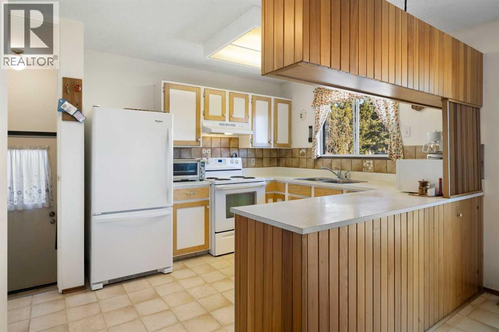 472 Cedarpark Drive SW, Calgary, Alberta  T2W 2J7 - Photo 19 - A2299627