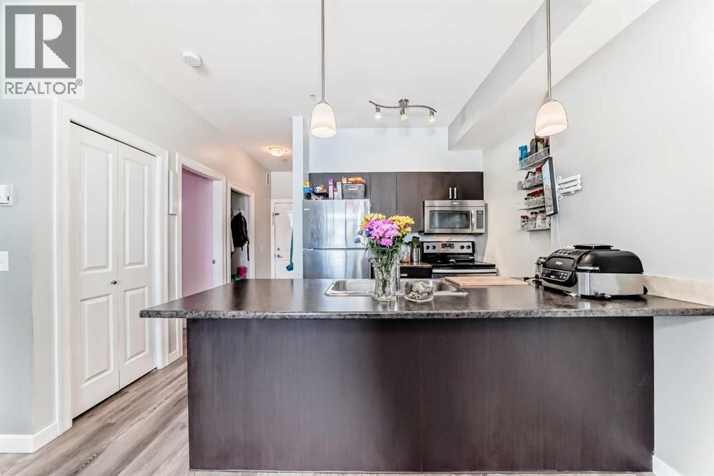 101, 117 Copperpond Common SE, Calgary, Alberta  T2Z 5E2 - Photo 7 - A2302487