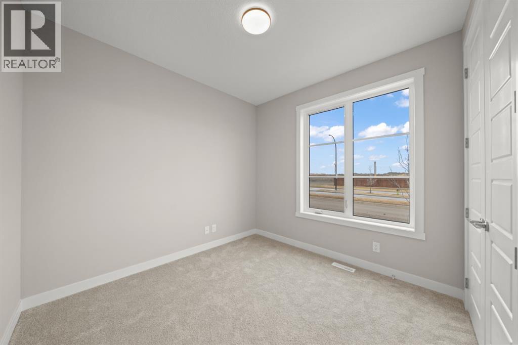 21 Sora Gate SE, Calgary, Alberta  T3S 0M6 - Photo 5 - A2280059