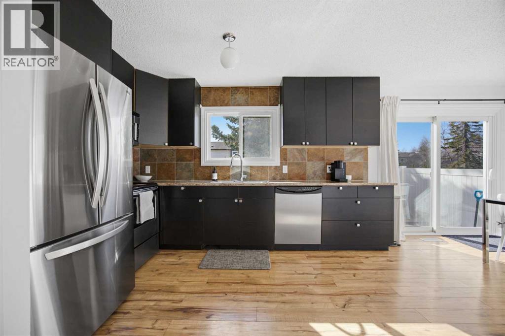 221 Deerpoint Lane Se, Calgary, Alberta  T2J 6M6 - Photo 13 - A2304085