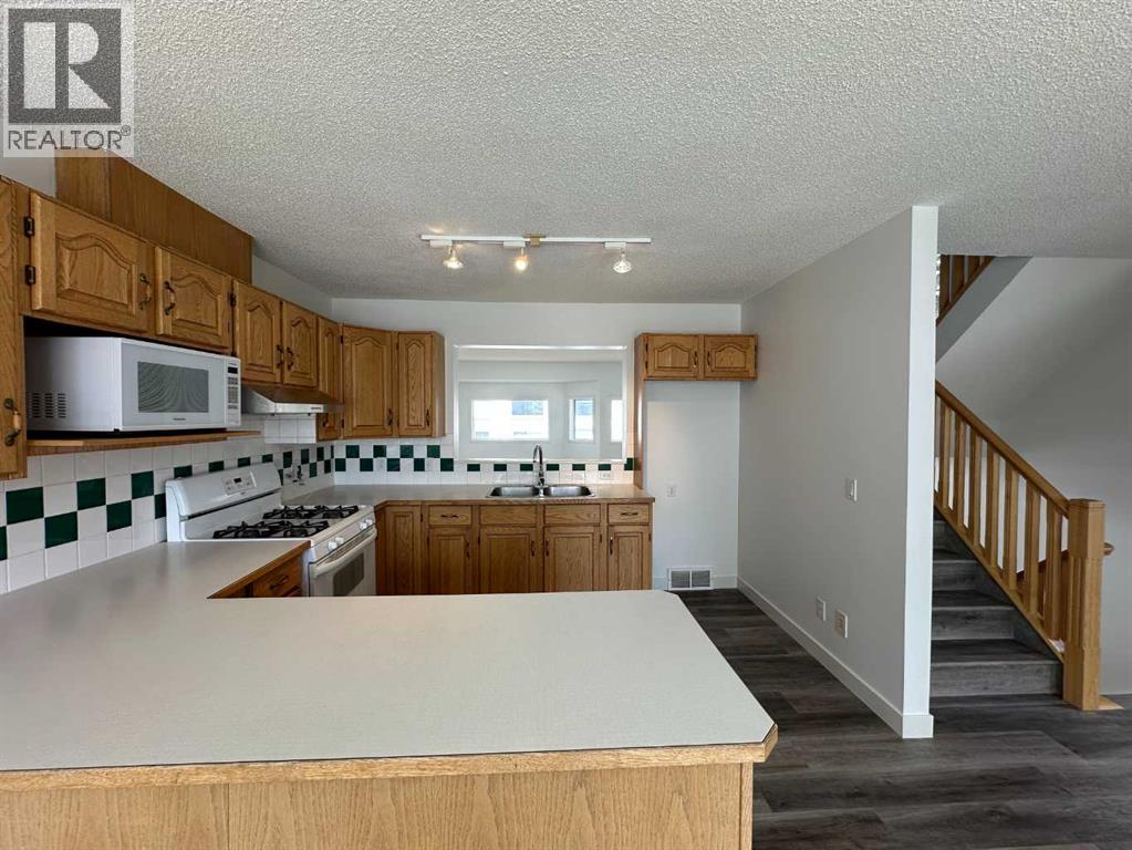 52 Kingsland Court Sw, Calgary, Alberta  T2V 0S2 - Photo 14 - A2303289