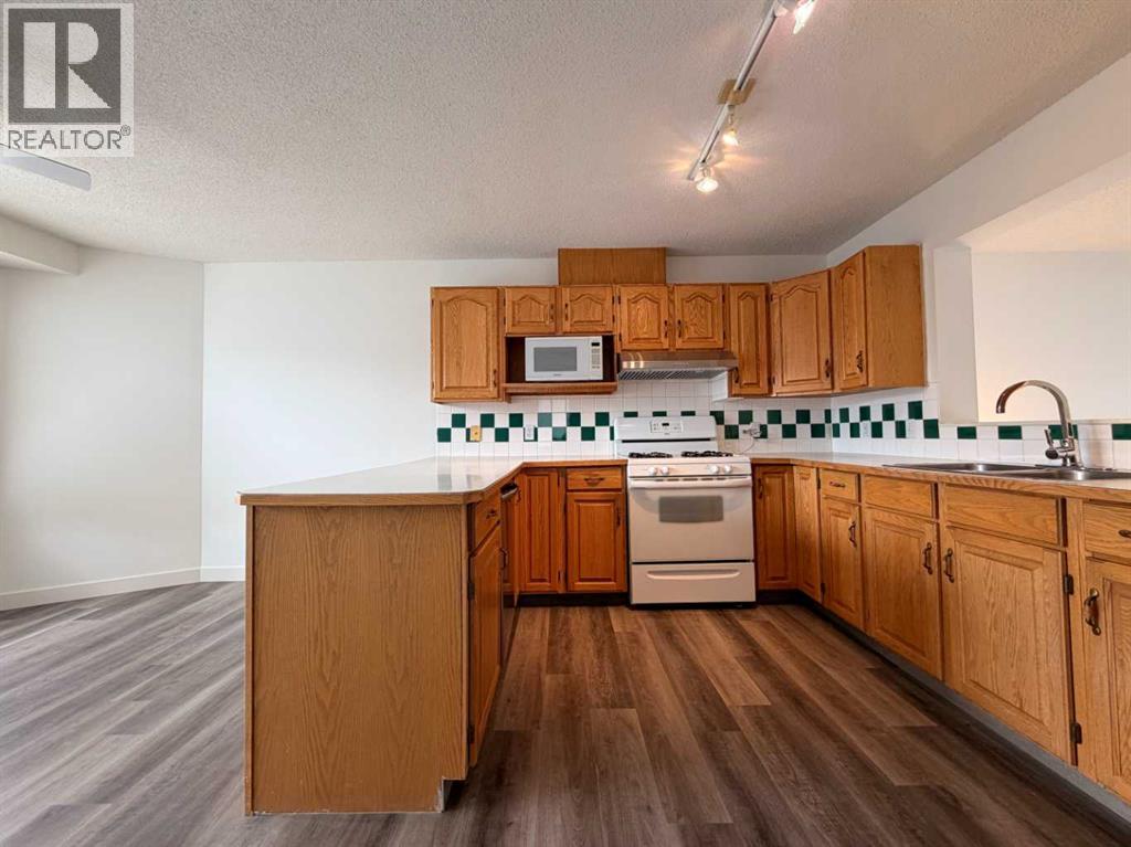 52 Kingsland Court Sw, Calgary, Alberta  T2V 0S2 - Photo 16 - A2303289