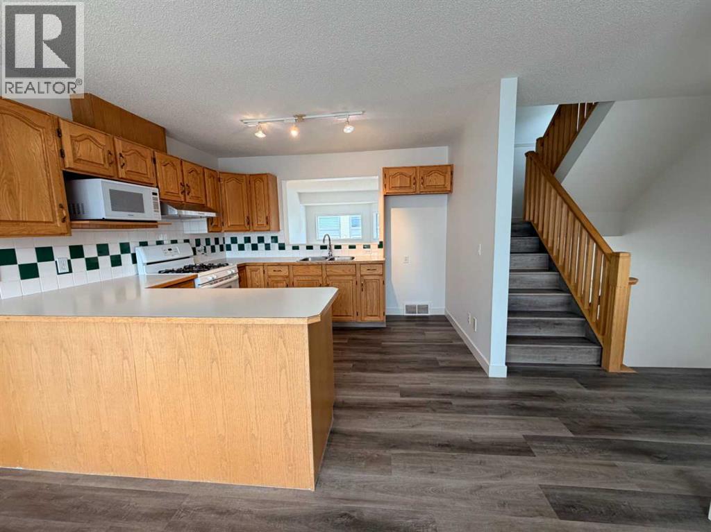 52 Kingsland Court Sw, Calgary, Alberta  T2V 0S2 - Photo 18 - A2303289