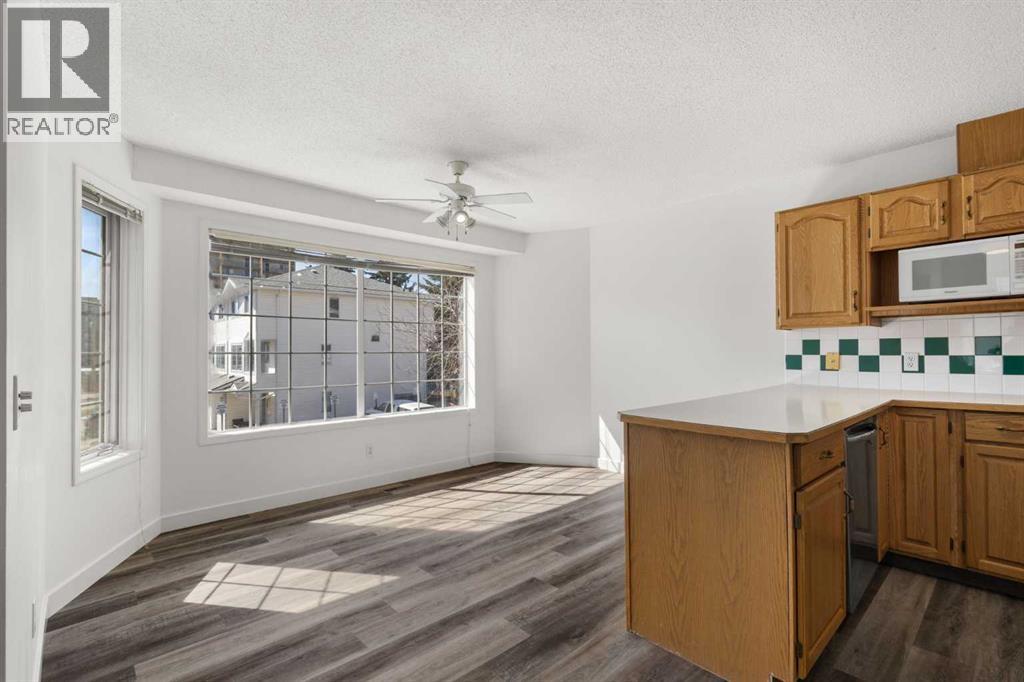 52 Kingsland Court Sw, Calgary, Alberta  T2V 0S2 - Photo 2 - A2303289