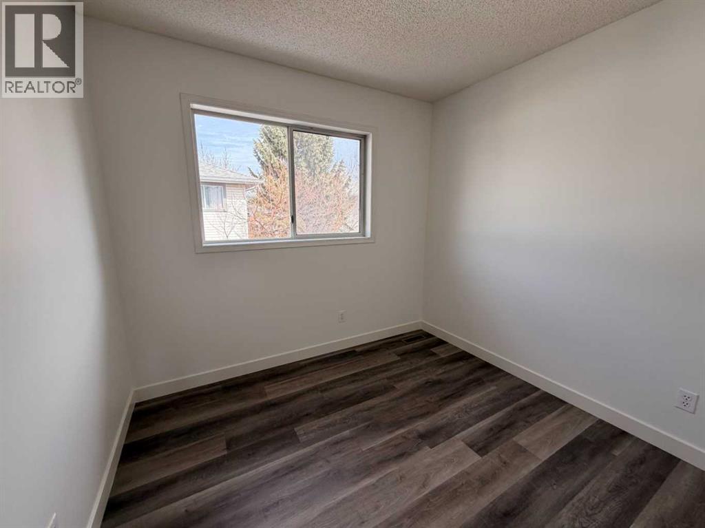 52 Kingsland Court Sw, Calgary, Alberta  T2V 0S2 - Photo 31 - A2303289