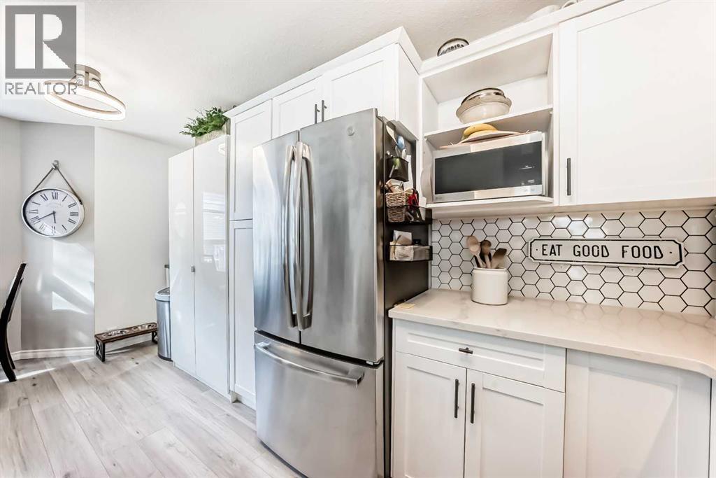 15 Spring Meadows Bay, Okotoks, Alberta  T1S 2G8 - Photo 5 - A2303115