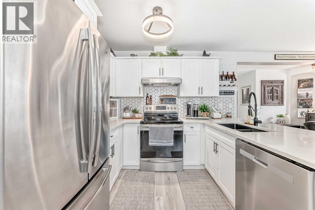 15 Spring Meadows Bay, Okotoks, Alberta  T1S 2G8 - Photo 23 - A2303115