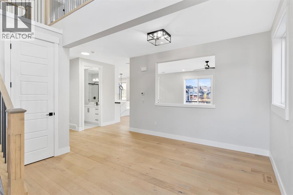 215 Kinniburgh Place, Chestermere, Alberta  T1X 1Y1 - Photo 5 - A2304772