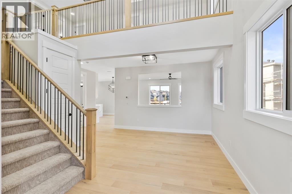 215 Kinniburgh Place, Chestermere, Alberta  T1X 1Y1 - Photo 4 - A2304772