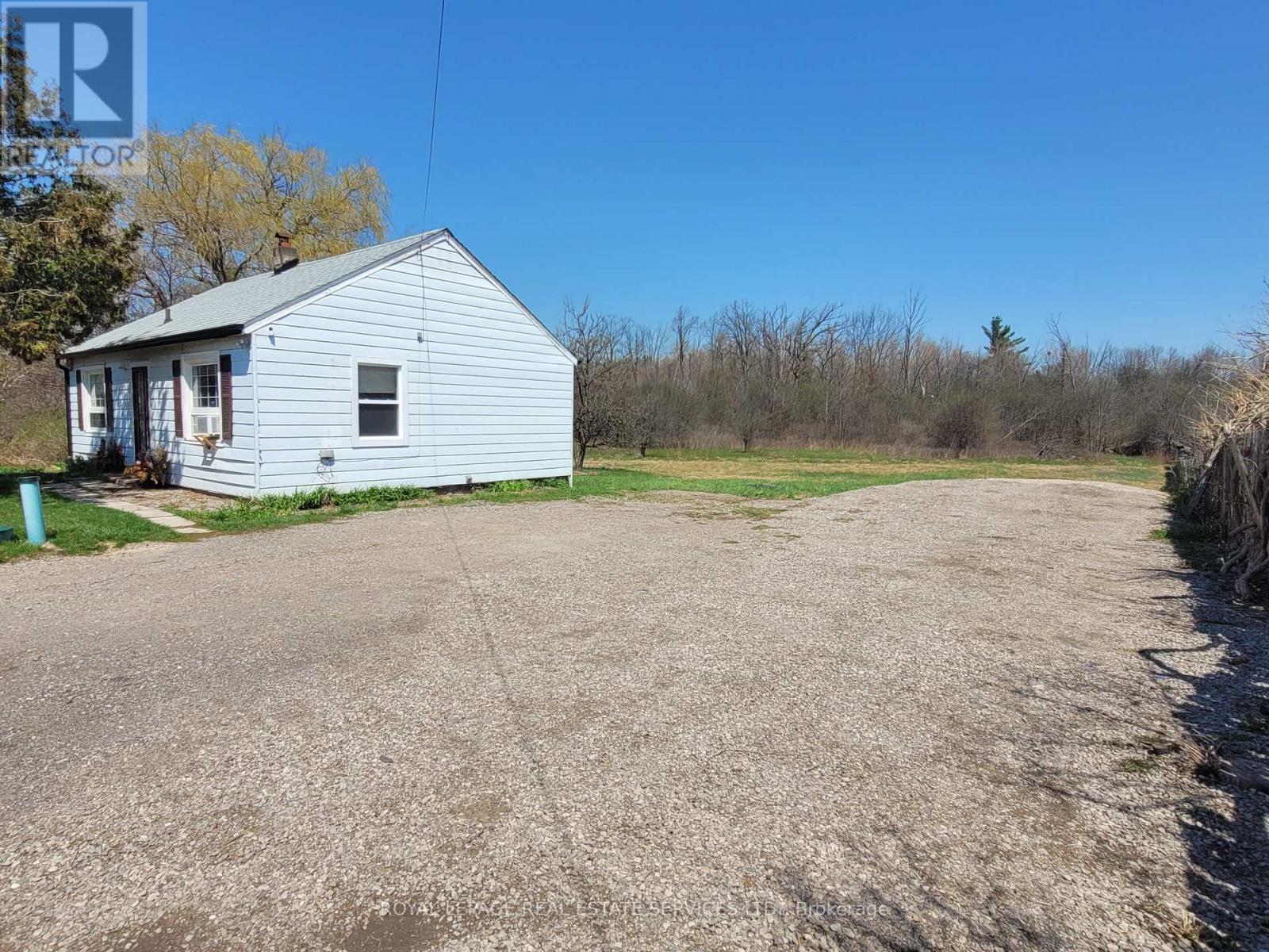 3209 Bronte Road, Oakville, Ontario  L6M 4J3 - Photo 3 - W12943224