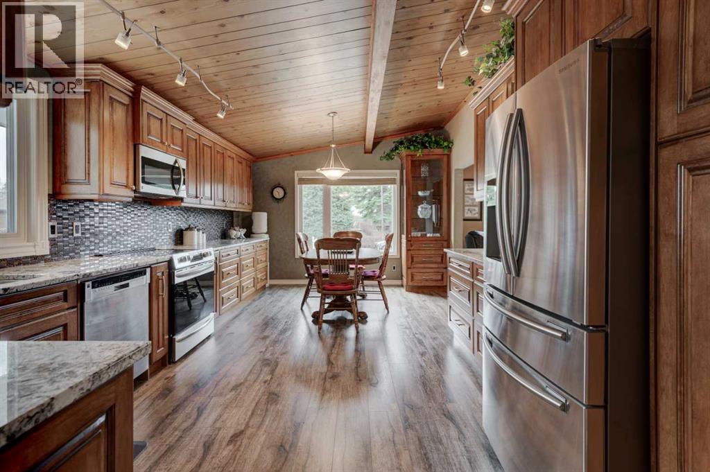 1032 Cantabrian Drive Sw, Calgary, Alberta  T2W 1L7 - Photo 10 - A2301520