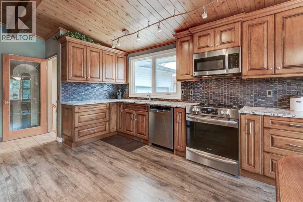 1032 Cantabrian Drive Sw, Calgary, Alberta  T2W 1L7 - Photo 9 - A2301520