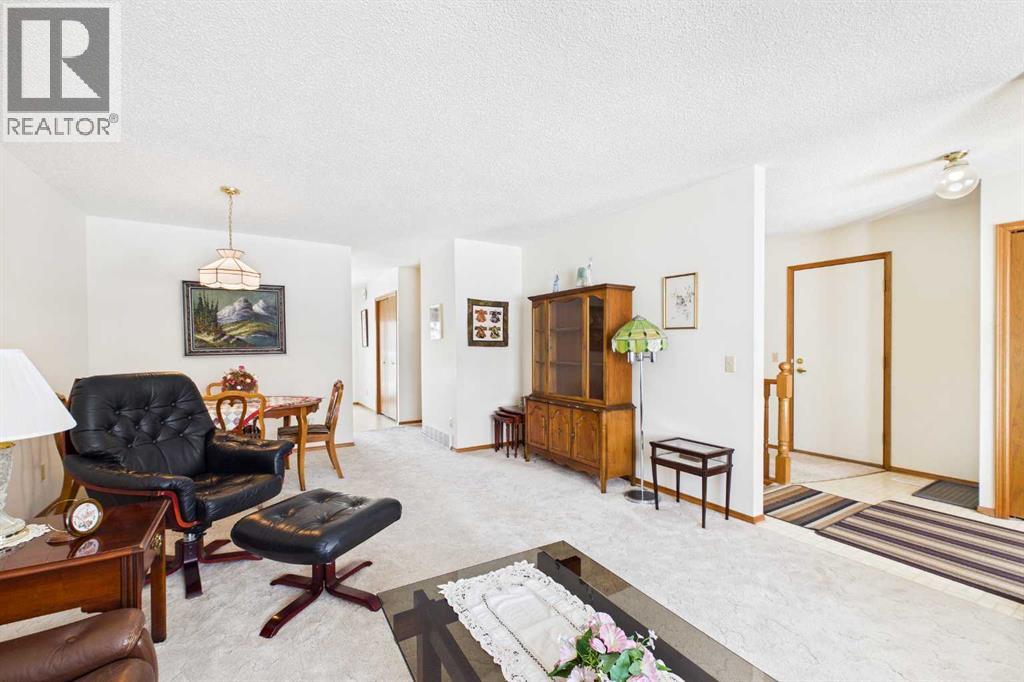 115 Macewan Park Heights Nw, Calgary, Alberta  T3K 3W6 - Photo 3 - A2297699