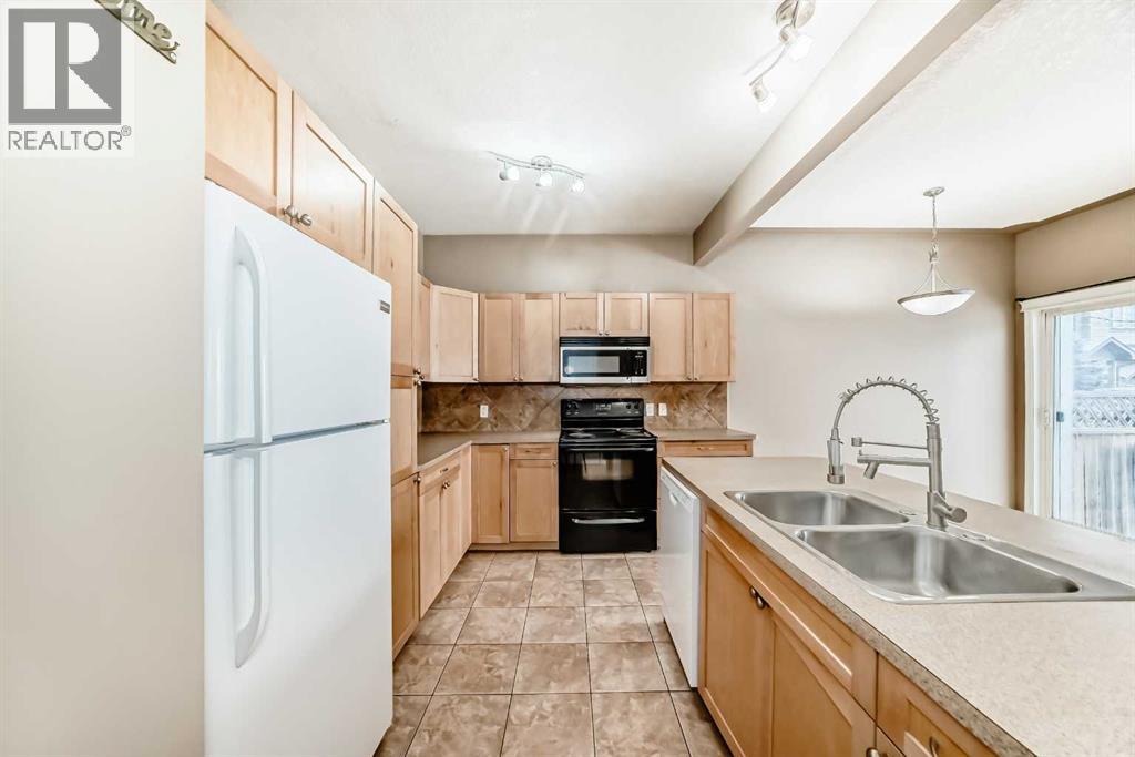 207, 620 Luxstone Landing SW, Airdrie, Alberta  T4B 0B5 - Photo 45 - A2291301