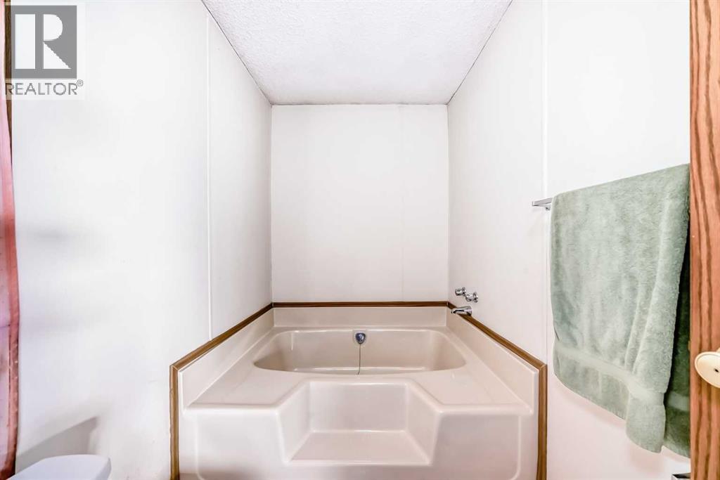 3227 Burroughs Manor NE, Calgary, Alberta  T1Y 6K1 - Photo 19 - A2290599