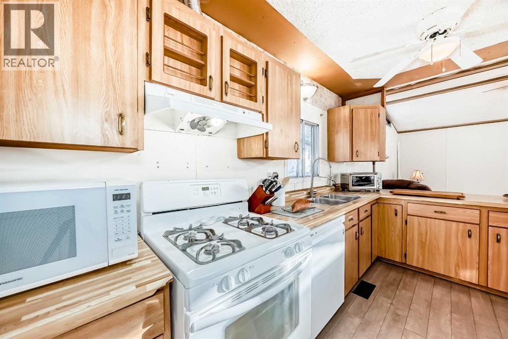 3227 Burroughs Manor NE, Calgary, Alberta  T1Y 6K1 - Photo 7 - A2290599