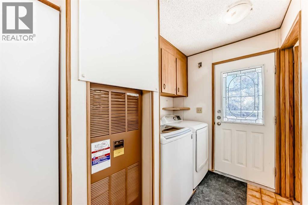 3227 Burroughs Manor NE, Calgary, Alberta  T1Y 6K1 - Photo 25 - A2290599