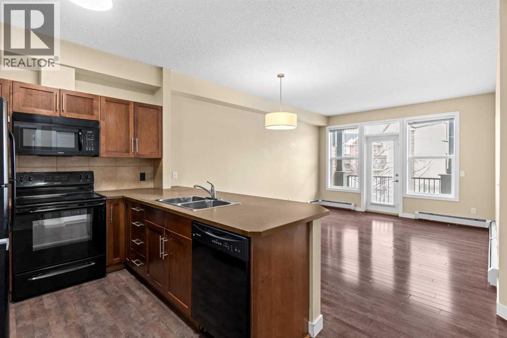 212, 10 Panatella Road NW, Calgary, Alberta  T3K 0V4 - Photo 3 - A2298777