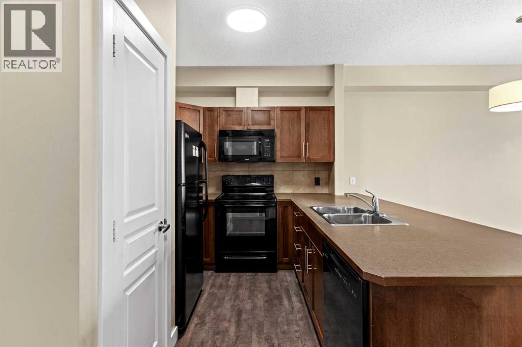 212, 10 Panatella Road NW, Calgary, Alberta  T3K 0V4 - Photo 4 - A2298777