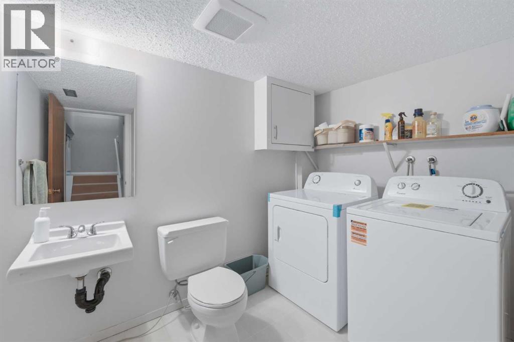 52a Millcrest Green SW, Calgary, Alberta  T2Y 2K1 - Photo 21 - A2301094