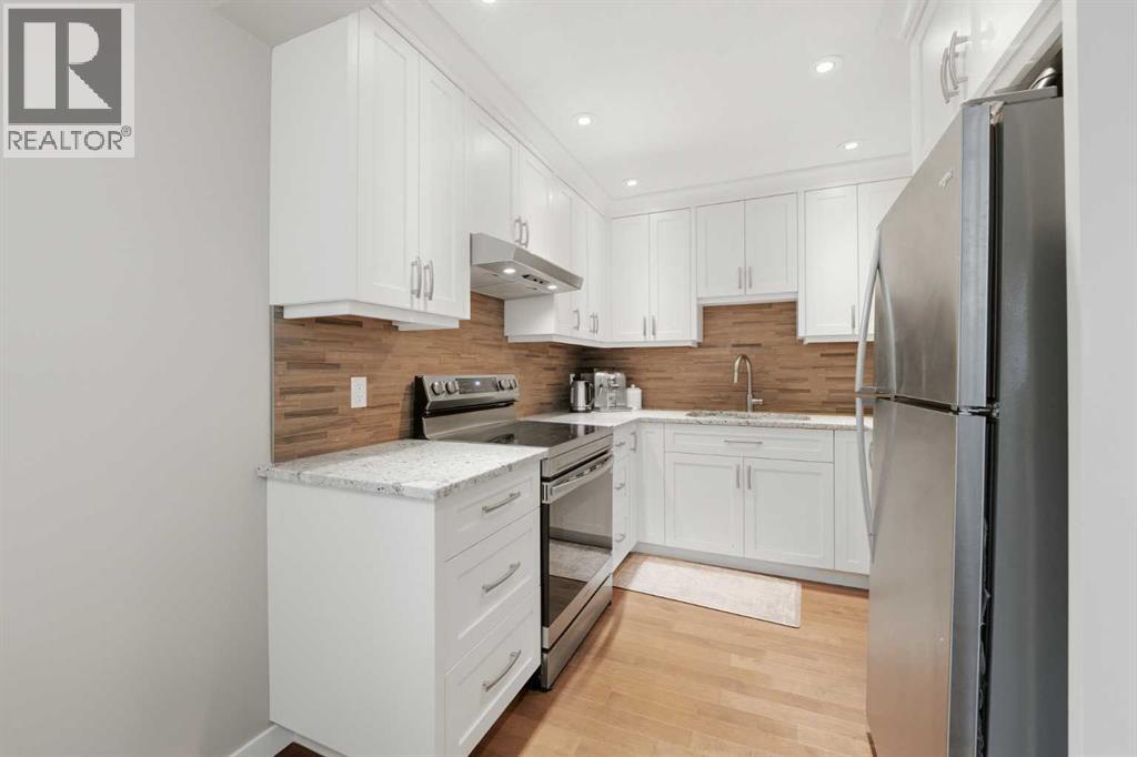 52a Millcrest Green SW, Calgary, Alberta  T2Y 2K1 - Photo 6 - A2301094