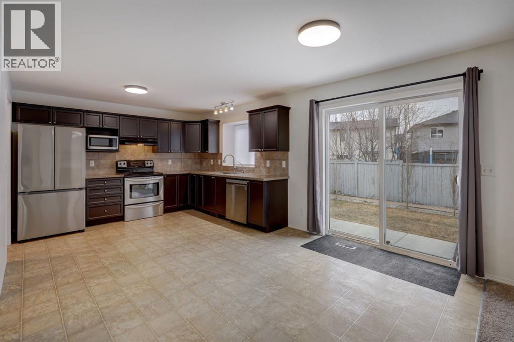 233 Luxstone Road Sw, Airdrie, Alberta  T4B 0K5 - Photo 2 - A2296582