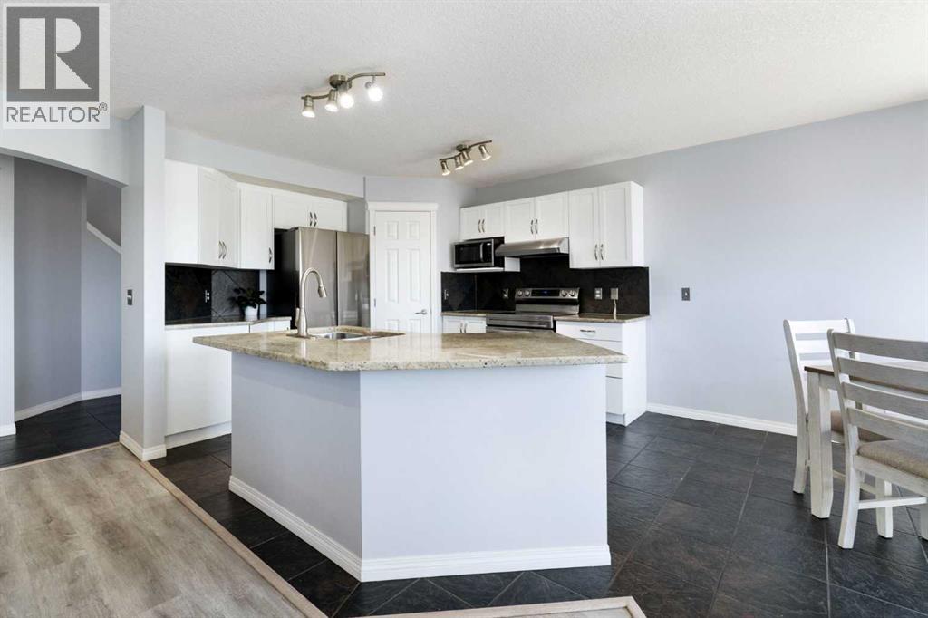 57 Bridlecrest Court SW, Calgary, Alberta  T2Y 5J3 - Photo 9 - A2304644