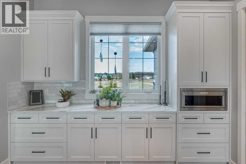 32172 Willow Way, Rural Rocky View County, Alberta  T4C 2Y4 - Photo 9 - A2303549