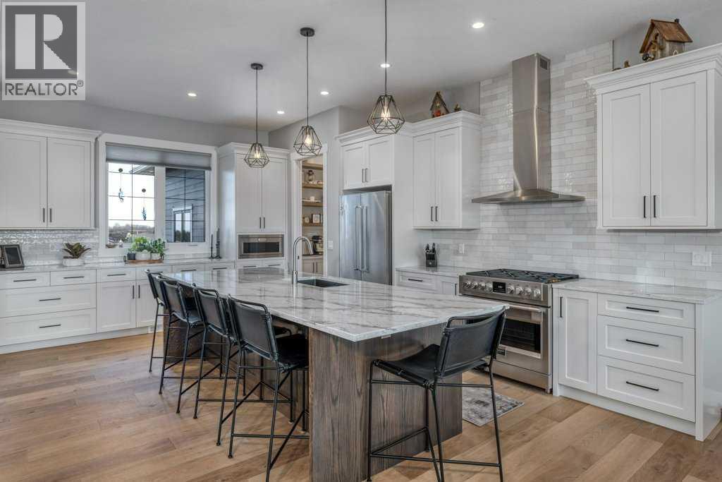 32172 Willow Way, Rural Rocky View County, Alberta  T4C 2Y4 - Photo 11 - A2303549