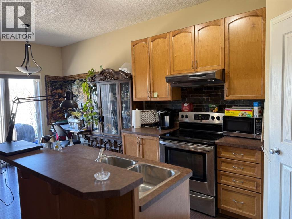 13 Tuscany Ridge Mews Nw, Calgary, Alberta  T3L 3B7 - Photo 6 - A2303363