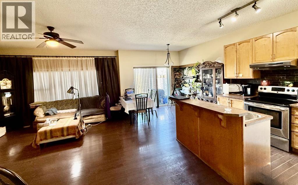 13 Tuscany Ridge Mews Nw, Calgary, Alberta  T3L 3B7 - Photo 5 - A2303363