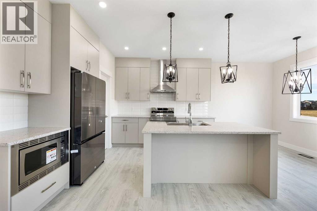 542 Ranch Green, Strathmore, Alberta  T1P 2H9 - Photo 6 - A2283527