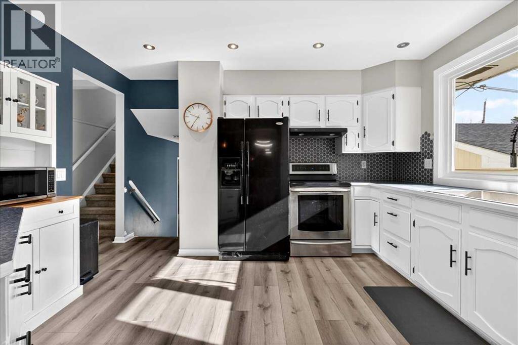 611 Lake Linnet Crescent Se, Calgary, Alberta  T2J 2J3 - Photo 9 - A2303802