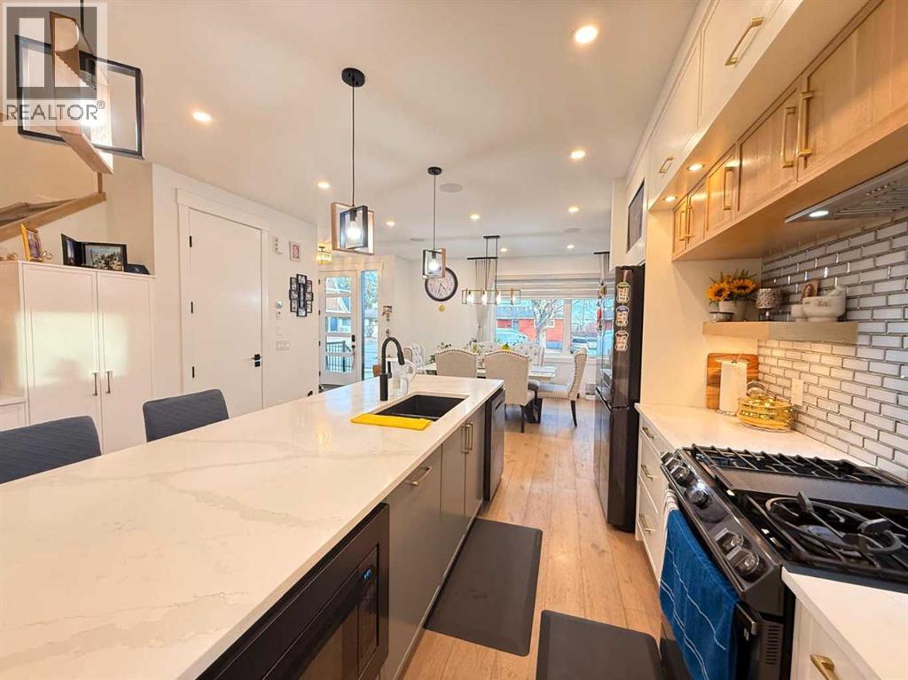 103 Hartford Road NW, Calgary, Alberta  T2K 2A7 - Photo 5 - A2282978