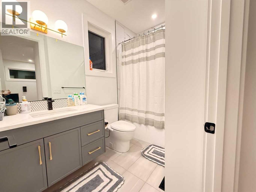 103 Hartford Road NW, Calgary, Alberta  T2K 2A7 - Photo 12 - A2282978