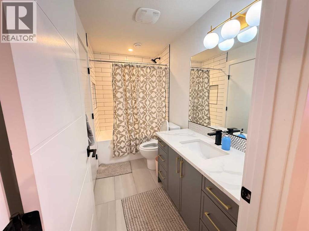 103 Hartford Road NW, Calgary, Alberta  T2K 2A7 - Photo 23 - A2282978